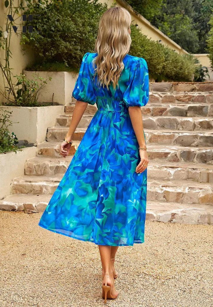 Vestito donna floreale midi, elegante e fresco, con scollo a V estivo.