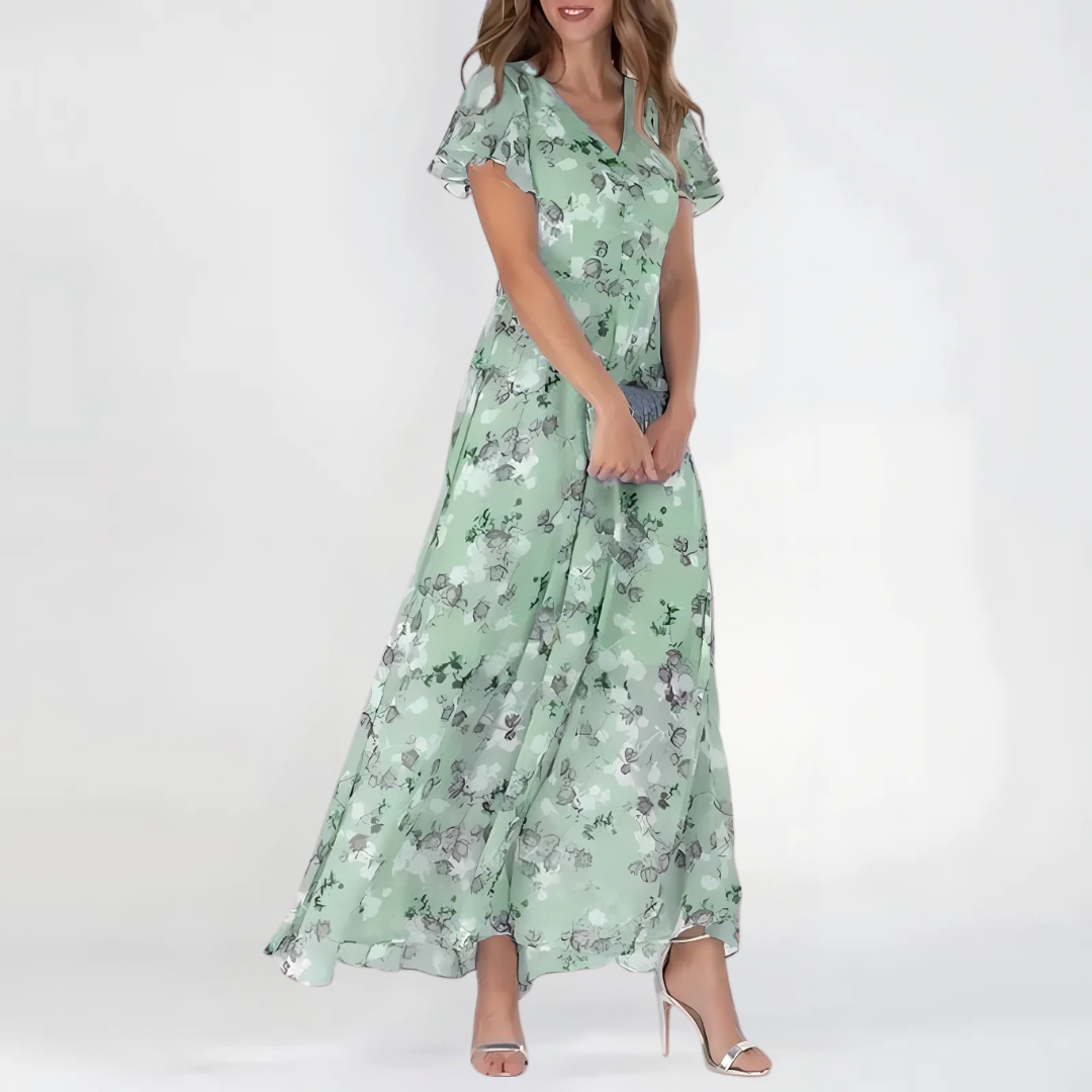 Abito midi floreale donna autunnale svolazzante. Ideale per eventi, cerimonie o look casual chic.