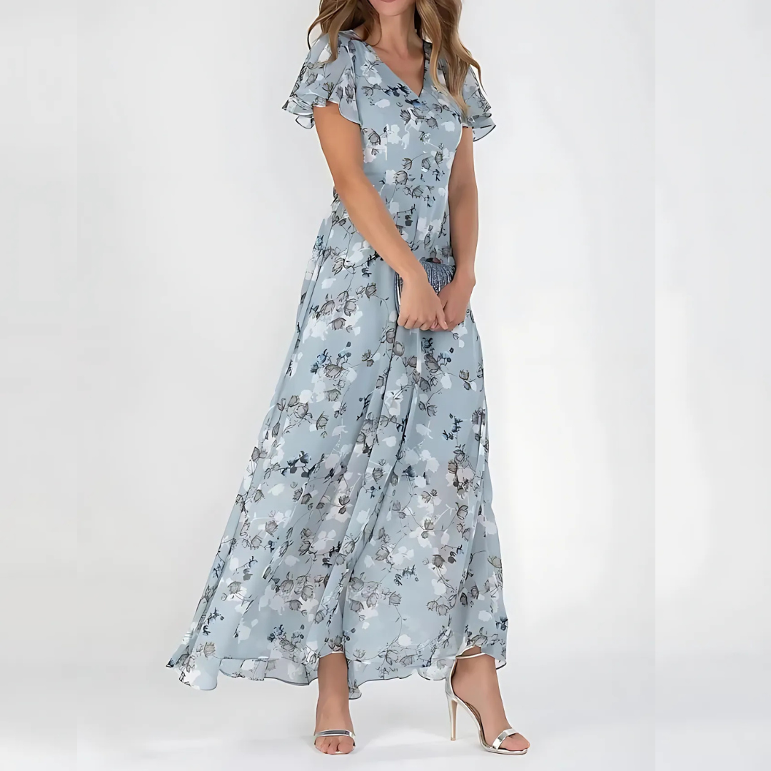 Abito midi floreale donna svolazzante, stampa autunnale. Perfetto per un look elegante o casual chic.