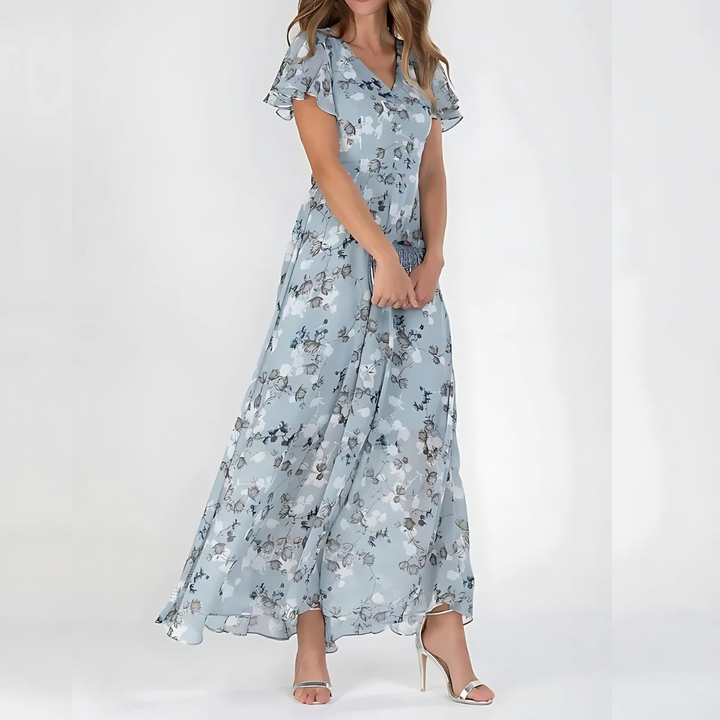 Abito midi floreale donna svolazzante, stampa autunnale. Perfetto per un look elegante o casual chic.