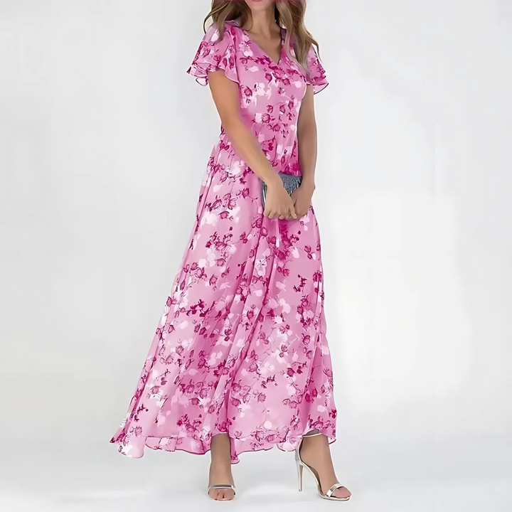 Vestito midi floreale svolazzante per donna. Stile elegante, perfetto per cerimonie e moda autunnale.