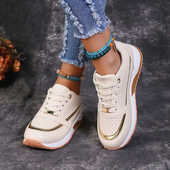 Moda donna: sneakers comode e versatili, perfette per passeggio estivo. Scarpe casual leggere per comfort quotidiano.