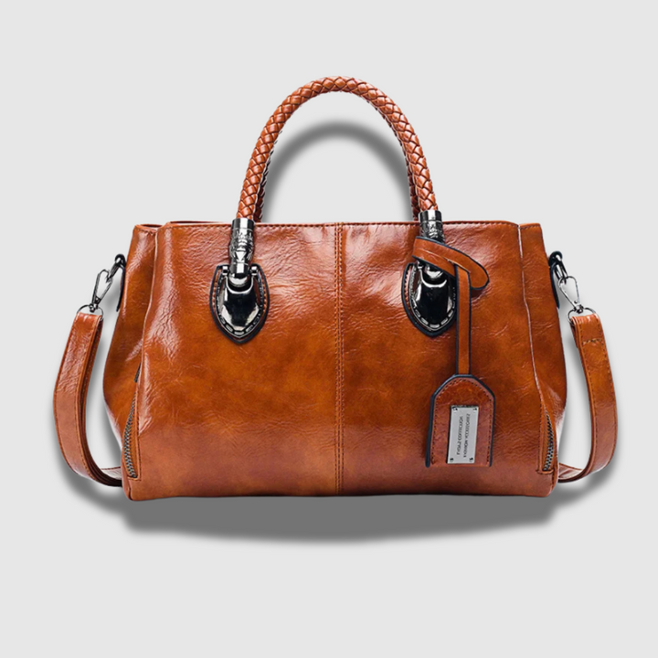 Borsa da donna chic con dettagli intrecciati sulla tracolla, un accessorio raffinato per ogni occasione.