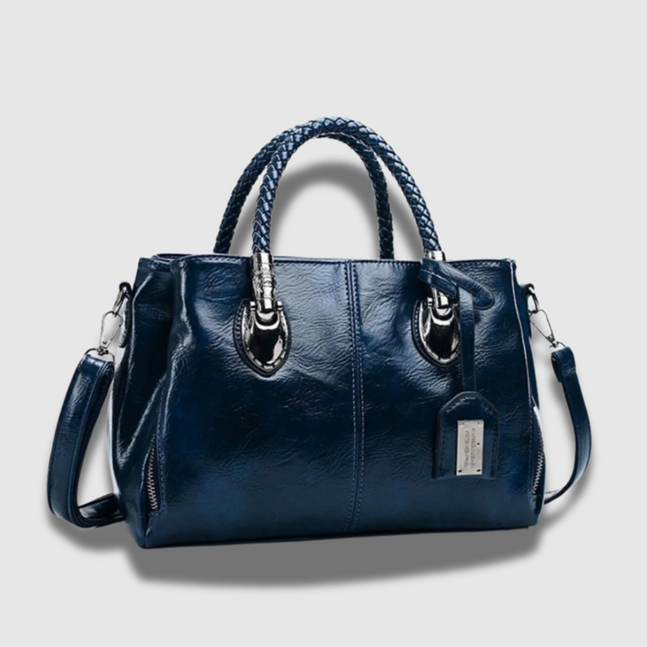 Borsetta da donna in pelle con tracolla intrecciata regolabile, ideale come accessorio quotidiano chic e pratico.