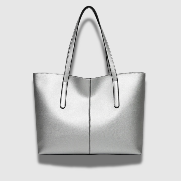 Accessorio moda: borsa tote donna in pelle lucida premium, design sofisticato, completa ogni outfit con eleganza.