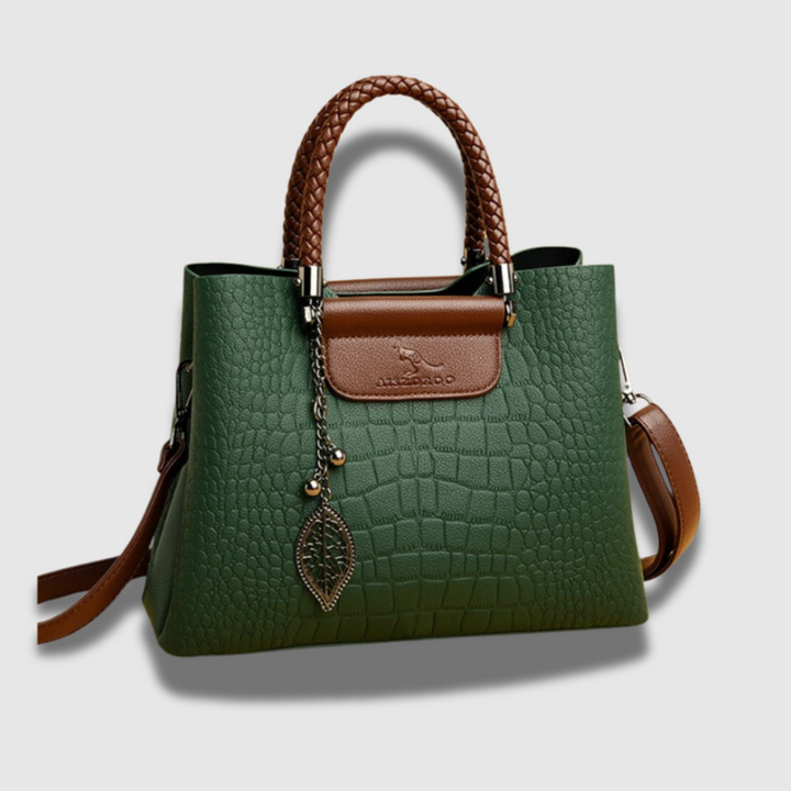 Borsa da donna elegante con effetto coccodrillo e manico intrecciato, accessorio sofisticato per ogni occasione.