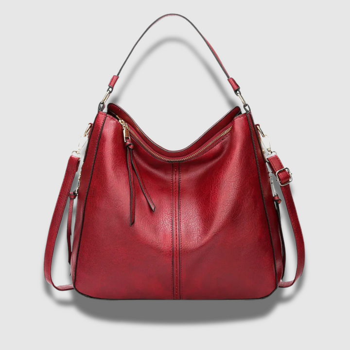 Borsa a tracolla donna in vera pelle, finitura di qualità, design moderno e comodo da indossare.