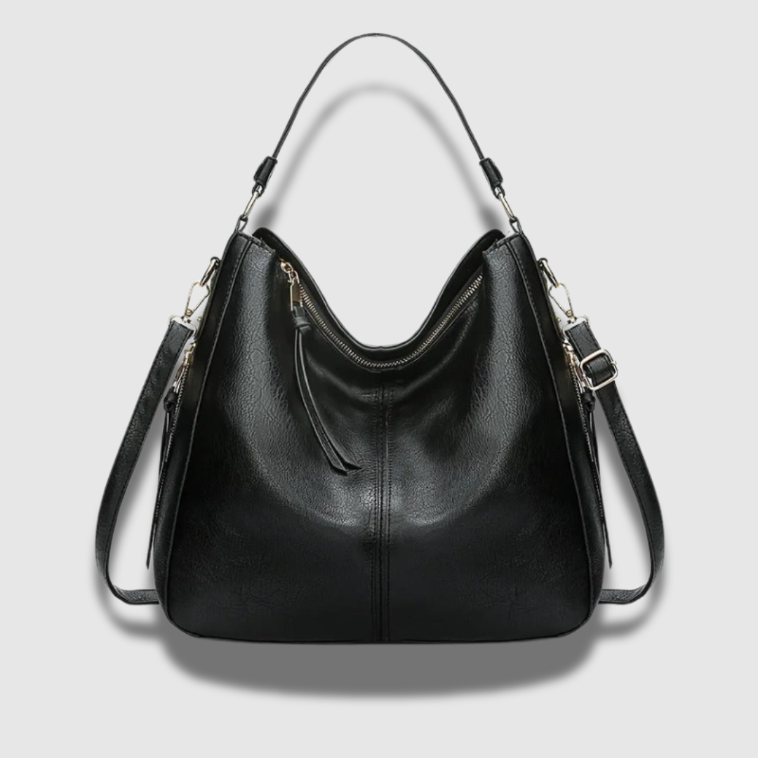 Borsa donna a tracolla in vera pelle, spaziosa e dal design raffinato, ideale per un look sofisticato.