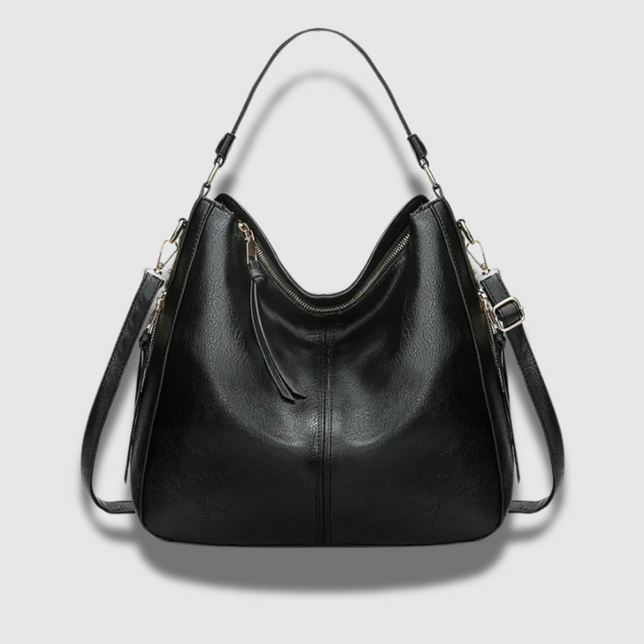 Borsa donna a tracolla in vera pelle, spaziosa e dal design raffinato, ideale per un look sofisticato.