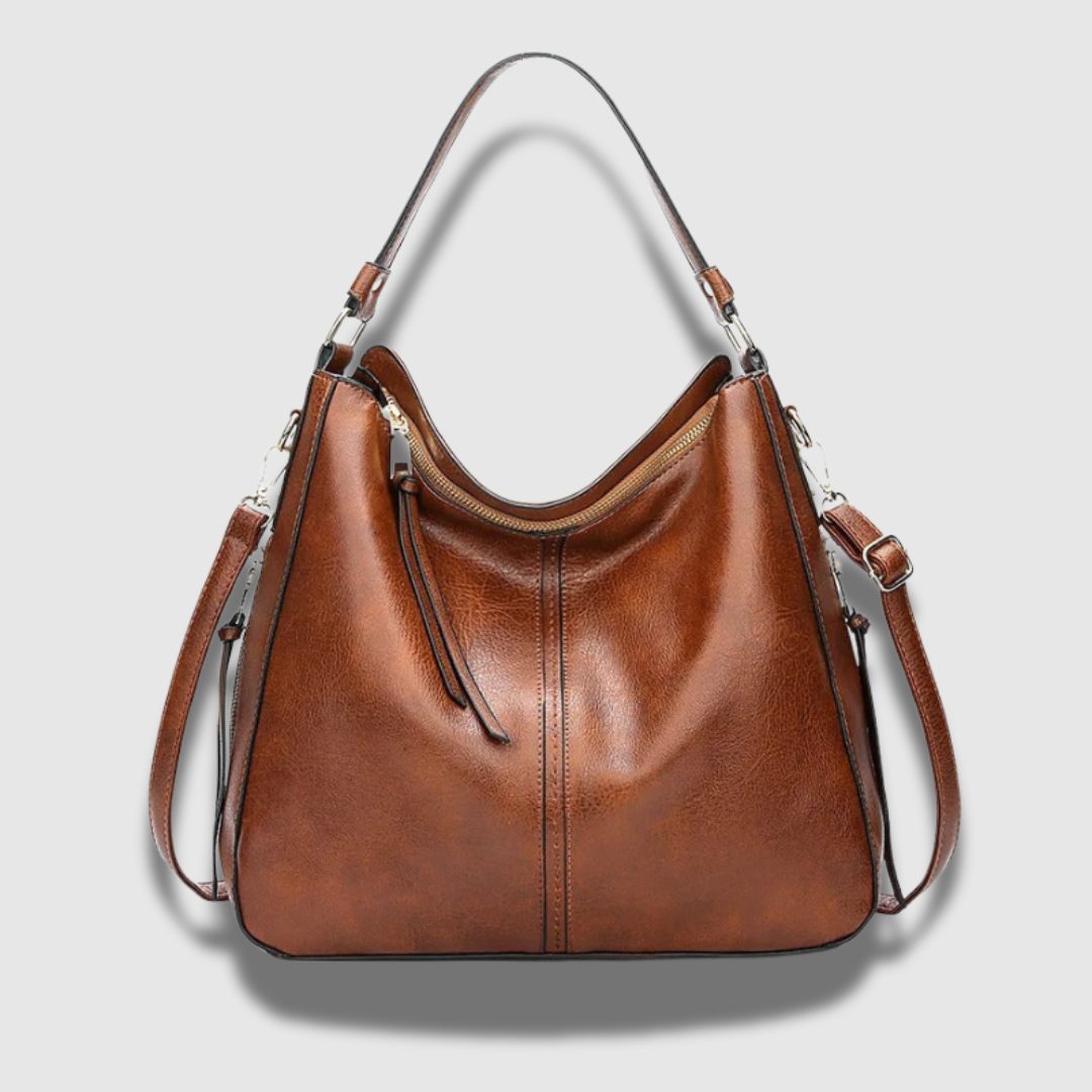 Borsa a tracolla da donna in vera pelle, elegante e versatile, accessorio moda perfetto per ogni occasione. [[lstfy-media:1]]
