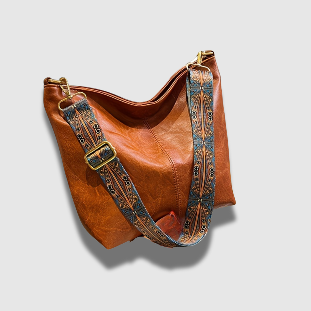 Borsa a tracolla da donna in pelle ricamata vintage chic, accessorio elegante per ogni outfit.