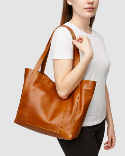 Borsa a tracolla donna in pelle sintetica con dettagli metallici, un accessorio moda chic e pratico.