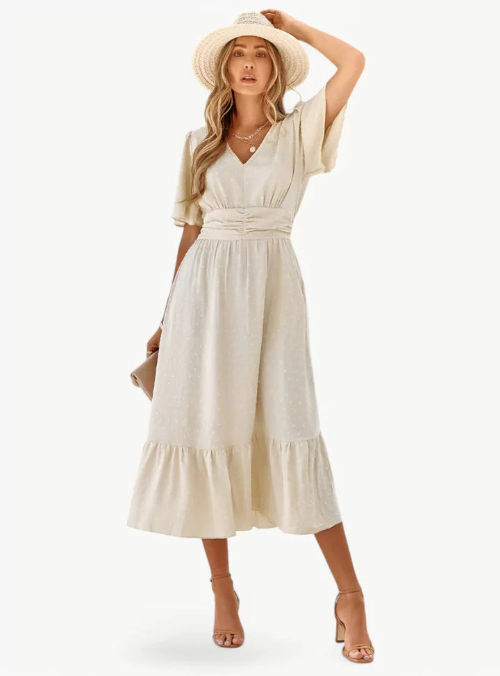 Abito estivo midi donna con scollo a V, stile casual, perfetto per l'estate e le vacanze.