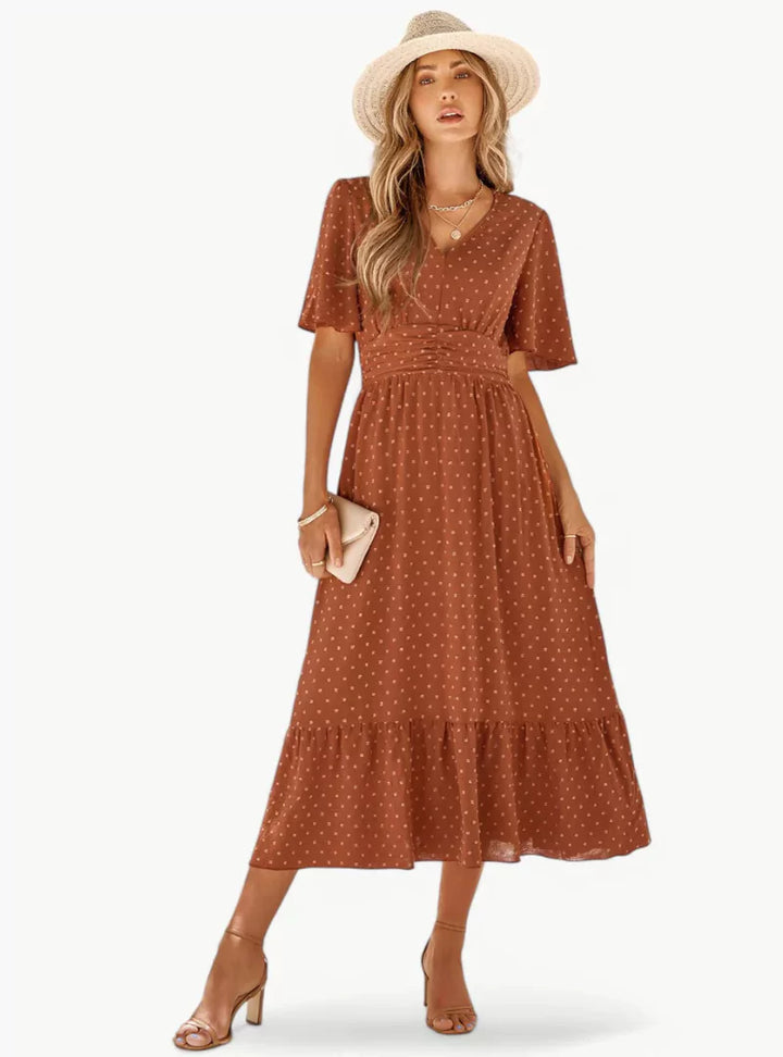 Abito estivo midi donna casual con scollo a V, vestito fluido e comodo per la moda primavera estate.