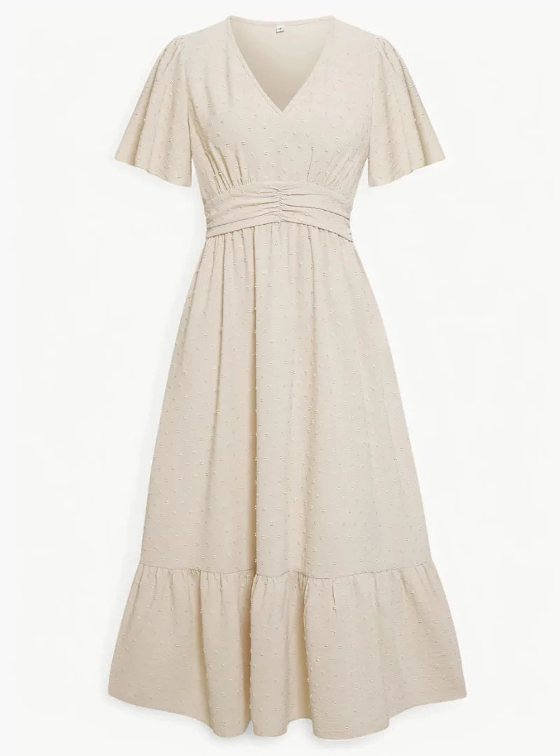 Abito midi donna fluido e comodo con scollo a V, perfetto per primavera estate e un look rilassato.