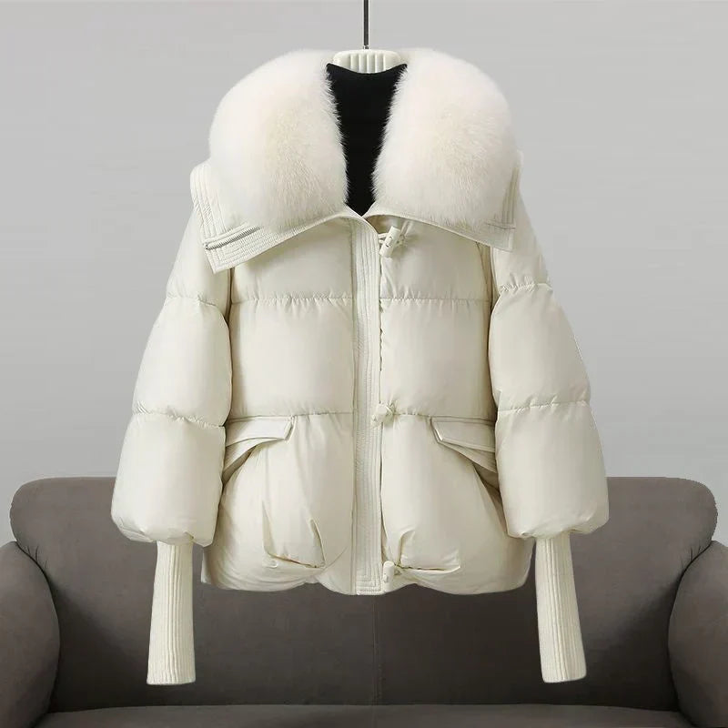Cappotto invernale donna caldo e avvolgente, piumino oversize elegante. Perfetto per la moda e la protezione dal freddo.