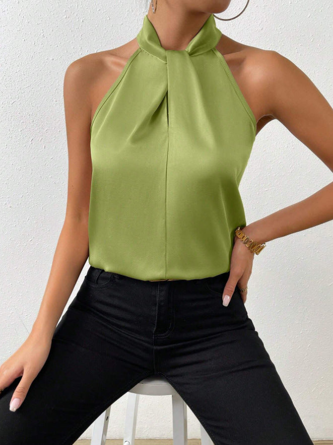 Top donna elegante con scollo all'americana. Dettagli con laccetti per un look sofisticato e moderno.