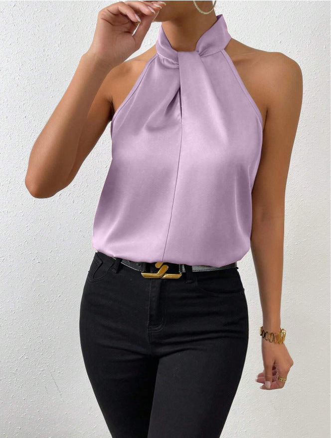 Scollo all'americana e laccetti: blusa elegante da donna, per un look estivo e sofisticato.
