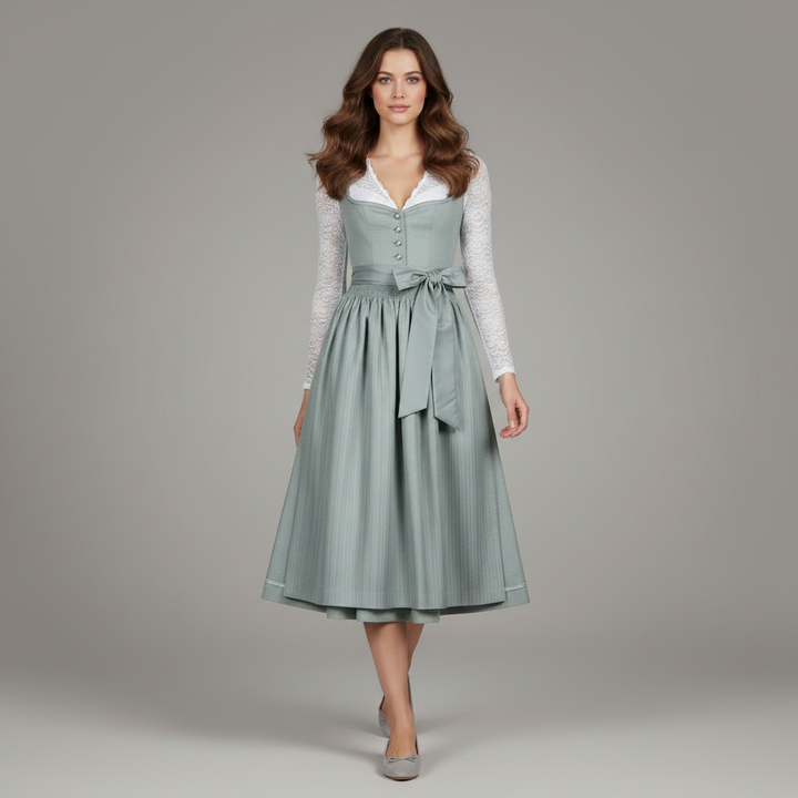 Abito tirolese da donna turchese completo di grembiule e camicetta, perfetto per feste tradizionali.