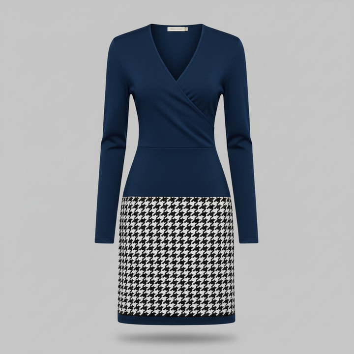 Primo piano su scollo a V e stampa a quadri dell'abito midi donna elegante. Dettaglio di moda autunnale.