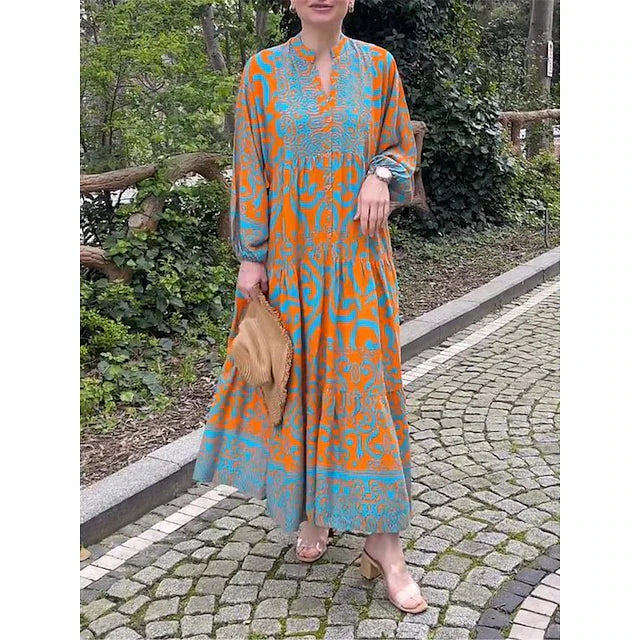 Maxi vestito casual donna albicocca con stampa etnica fluida. Perfetto abito bohemien a balze per l'estate.