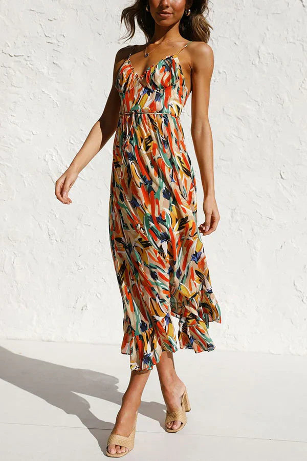 Vestito estivo donna midi elegante, stampa astratta e scollatura a V. Moda donna per un outfit estivo chic.