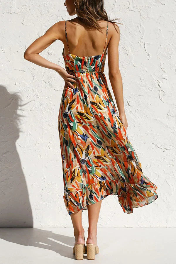 Vestito donna midi giallo e verde con stampa astratta moderna e scollatura a V profonda, vestibilità fluida.