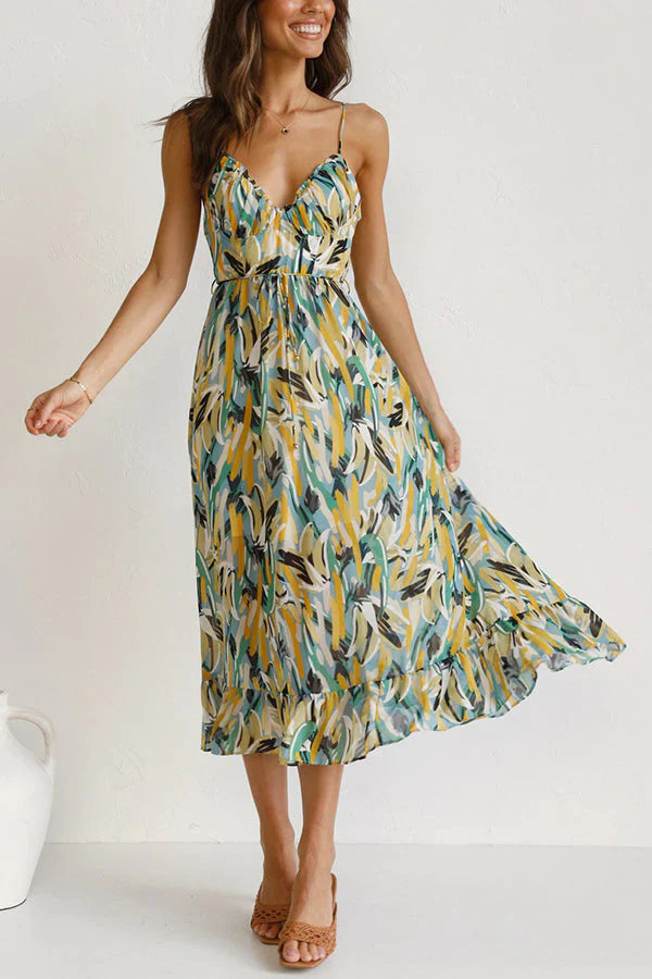 Vestito midi donna primavera/estate con stampa astratta e scollatura a V. Eleganza estiva per un look boho chic.