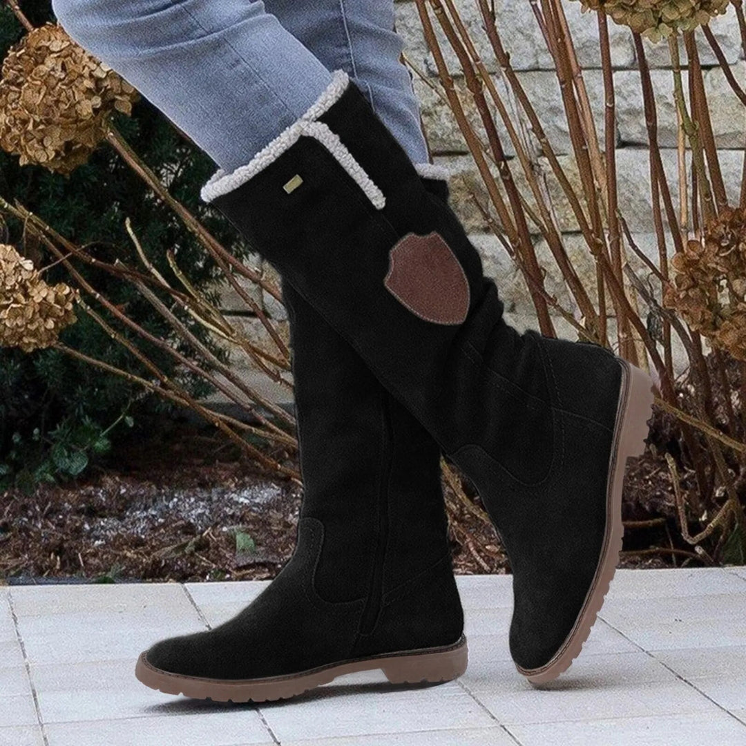 Stivali da donna foderati in peluche, calzature invernali calde e versatili per un look alla moda.