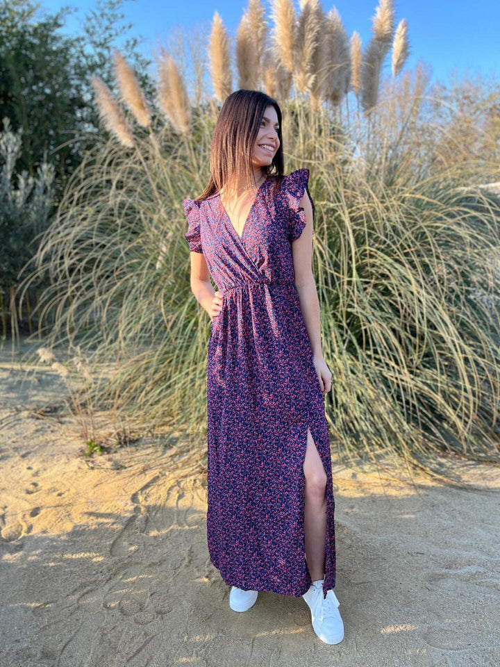 Abito lungo donna floreale blu con scollo incrociato e orlo a volant. Perfetto per un look casual elegante estivo.