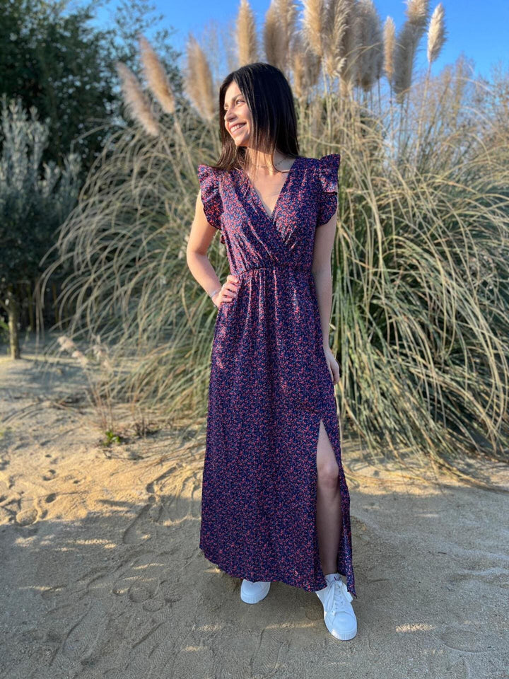 Vestito lungo donna blu con fantasia floreale, scollo incrociato. Ideale per la moda estiva, eleganza casual.