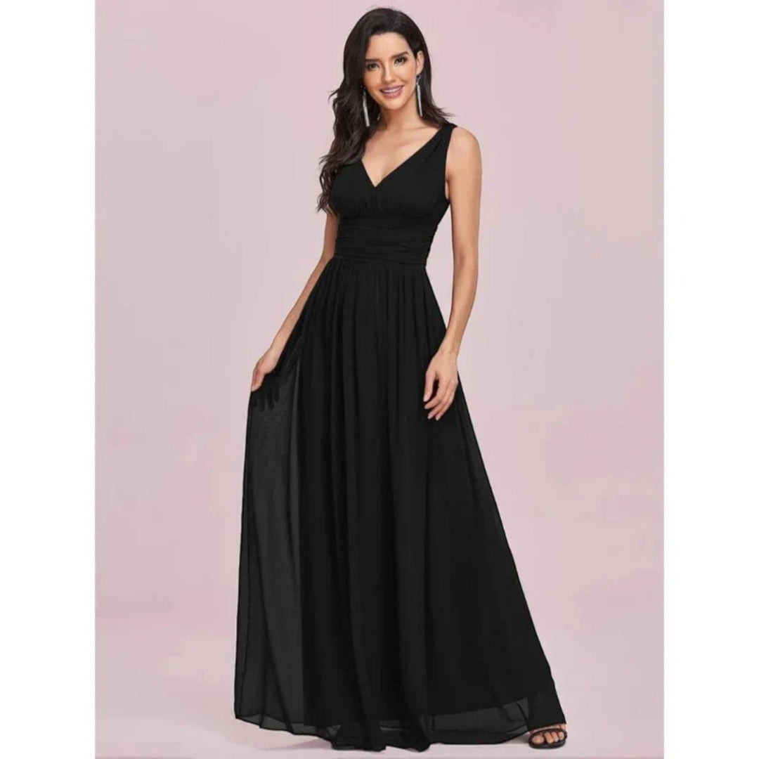 Abito maxi donna elegante primavera-estate, scollo a V, per un look raffinato e leggero.