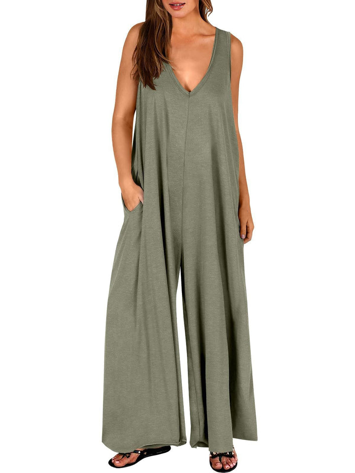 Elegante tuta intera donna, tessuto comodo, maniche lunghe, perfetta per lo stile autunnale casual.