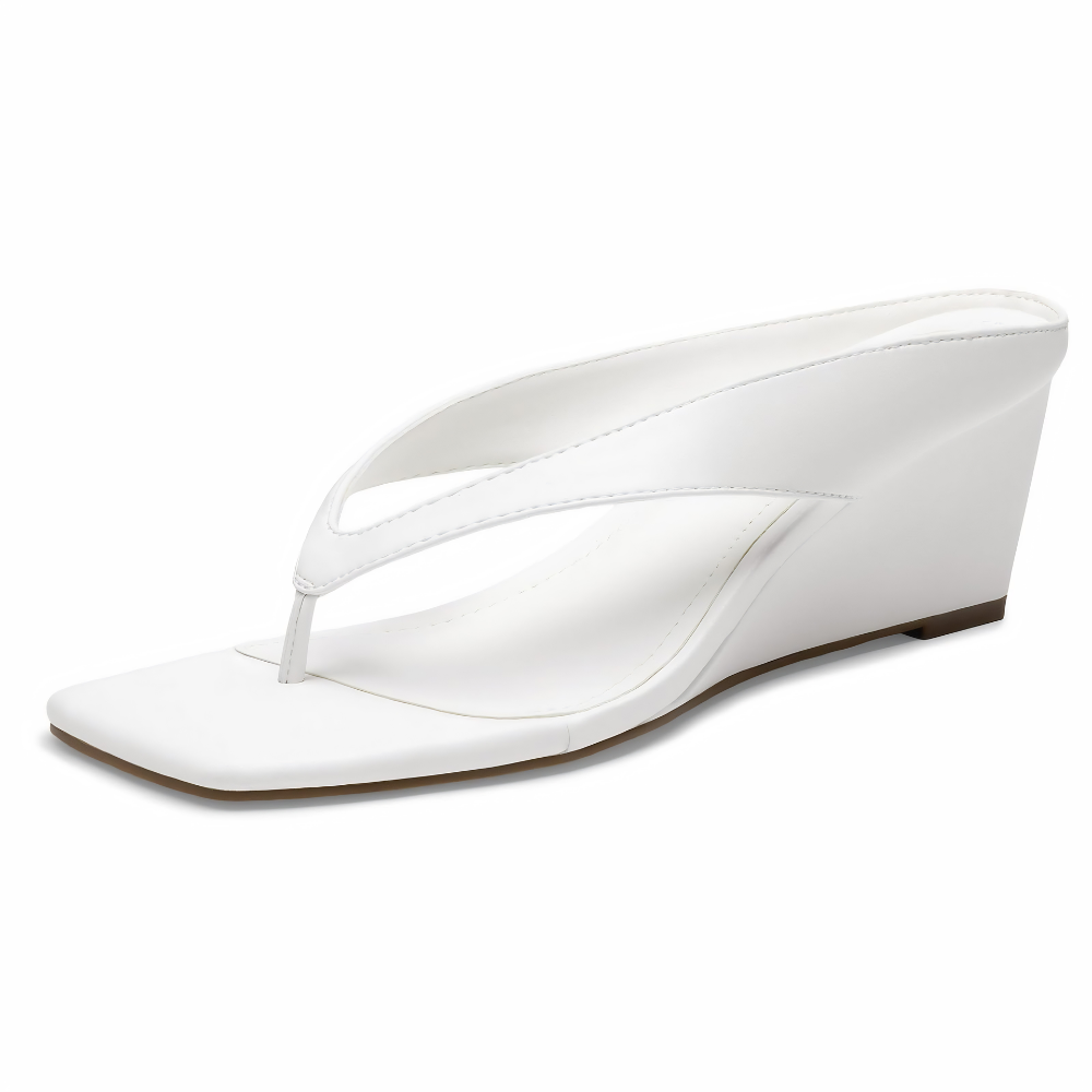 Scarpe estive donna: sandali infradito con zeppa alta, offrono comfort ed eleganza per ogni occasione.