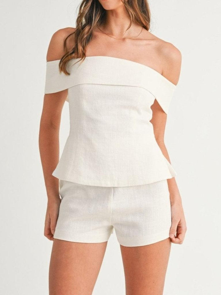 Completo due pezzi donna elegante misto cotone, top corto e pantaloni, perfetto per l'estate.