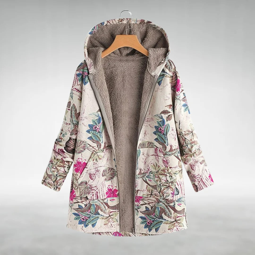 Giacca lunga donna floreale con cappuccio. Stile casual/elegante, perfetta per primavera/autunno nei toni del blu e bianco.