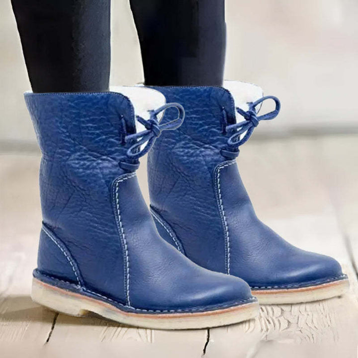 Stivali donna impermeabili con fodera calda, perfetti per proteggere i piedi dal freddo invernale.