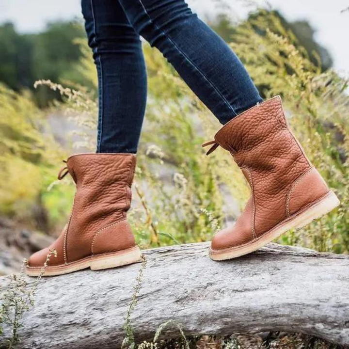 Calzature invernali donna eleganti, impermeabili e calde, perfette per ogni occasione.