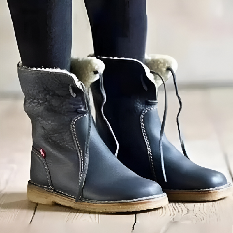 Stivali donna eleganti neri, impermeabili e caldi, perfetti per la moda inverno.