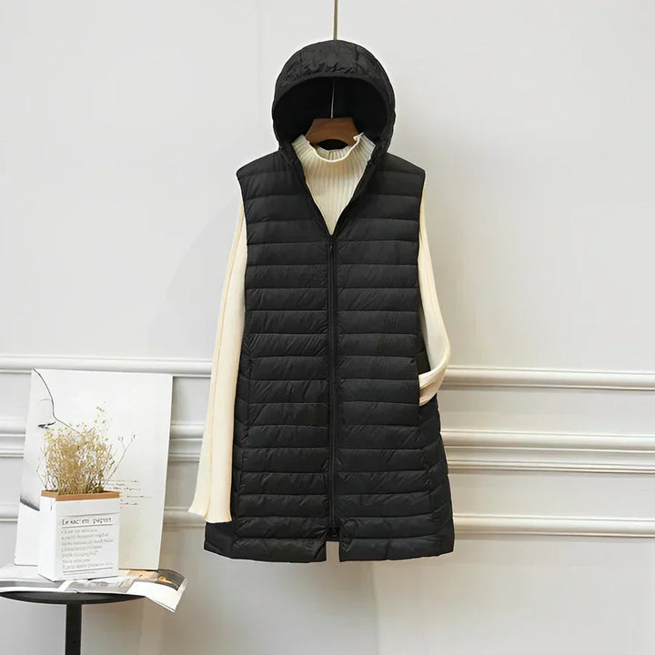 Cappotto lungo senza maniche donna, versatile e raffinato, per un look elegante. Abbigliamento femminile chic.