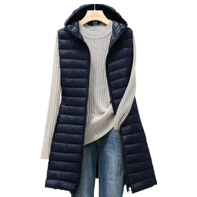 Cappotto chic lungo donna senza maniche, ideale per un look sofisticato. Soprabito femminile versatile e di tendenza.