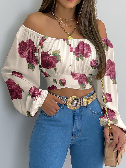 Top corto elegante da donna, con spalle scoperte e maniche lunghe. Per outfit primavera estate di tendenza.