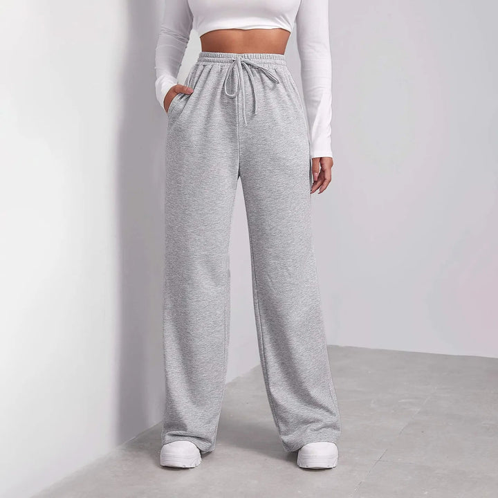 Eleganti pantaloni grigi da donna a gamba dritta per ufficio, ideali per comfort e stile.