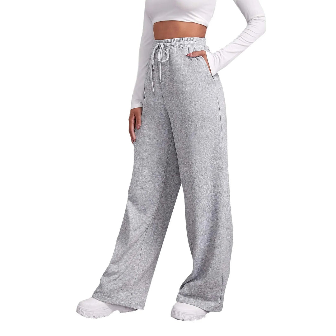 Pantaloni donna grigi versatili a gamba dritta, adatti per outfit eleganti o casual chic.