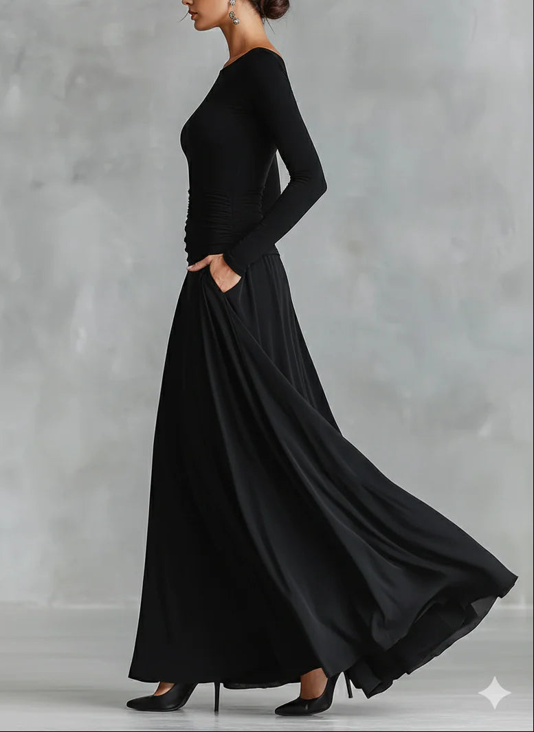 Abito nero lungo donna, design elegante con scollo a barca e maniche lunghe, ideale per eventi formali e serate.