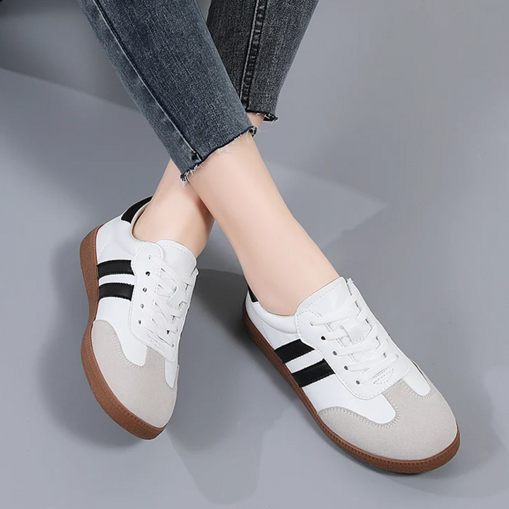 Scarpe sneakers basse da donna imbottite, ideali per comfort e stile casual quotidiano. [[lstfy-media:2]]