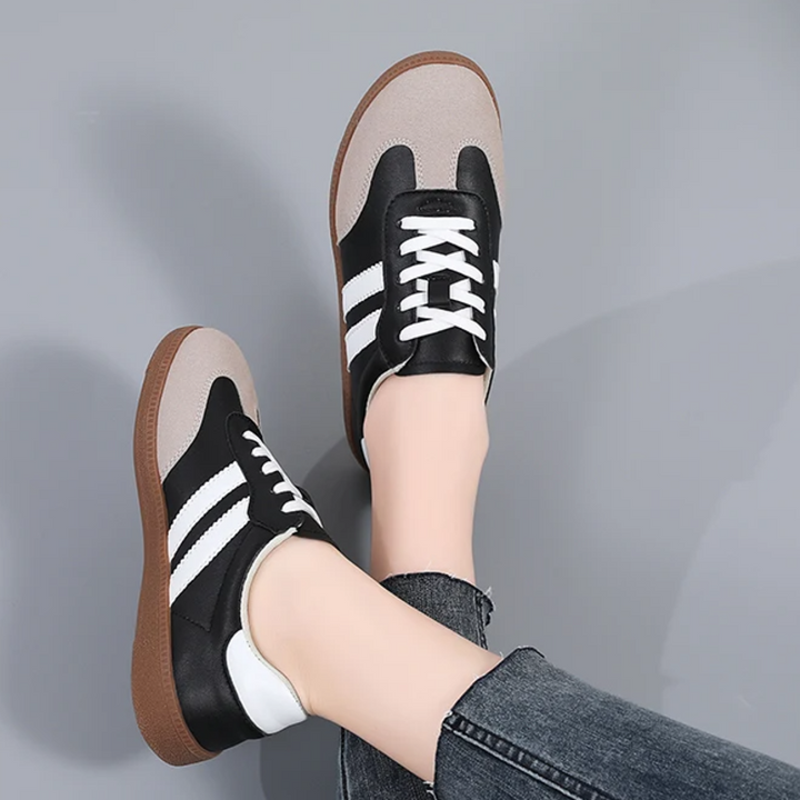Sneakers basse donna, scarpe sportive eleganti e comode, ideali per look casual quotidiani. [[lstfy-media:6]]