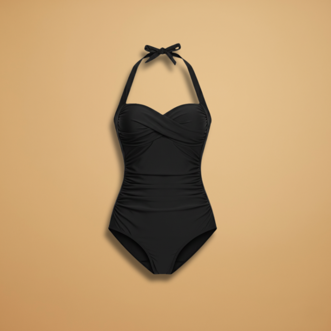 Elegante costume intero contenitivo per donna, perfetto per spiaggia e vacanze estive.