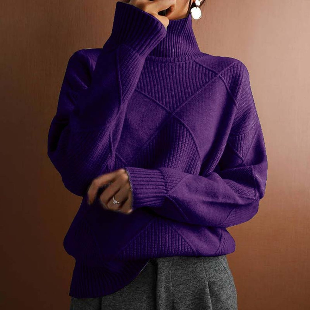 Maglione collo alto donna a rombi in stile vintage. Perfetto per un look casual-chic con un tocco retrò.