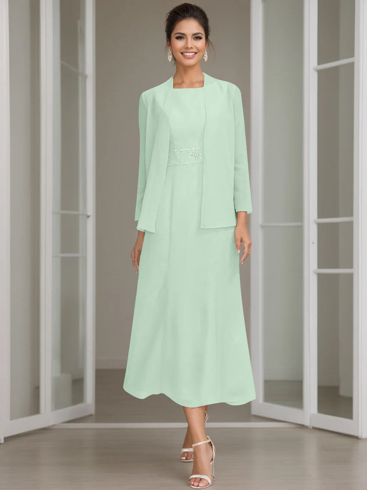 Vestito midi da cerimonia, giacca con perline, perfetto per un'invitata sofisticata.
